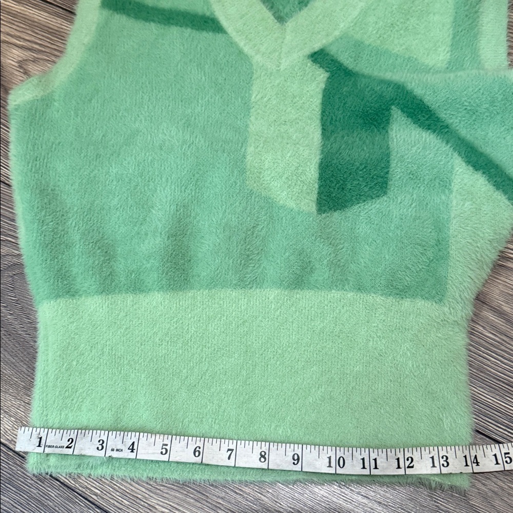 House of sunny
Green Geometric Knit Vest - Picture 9 of 11